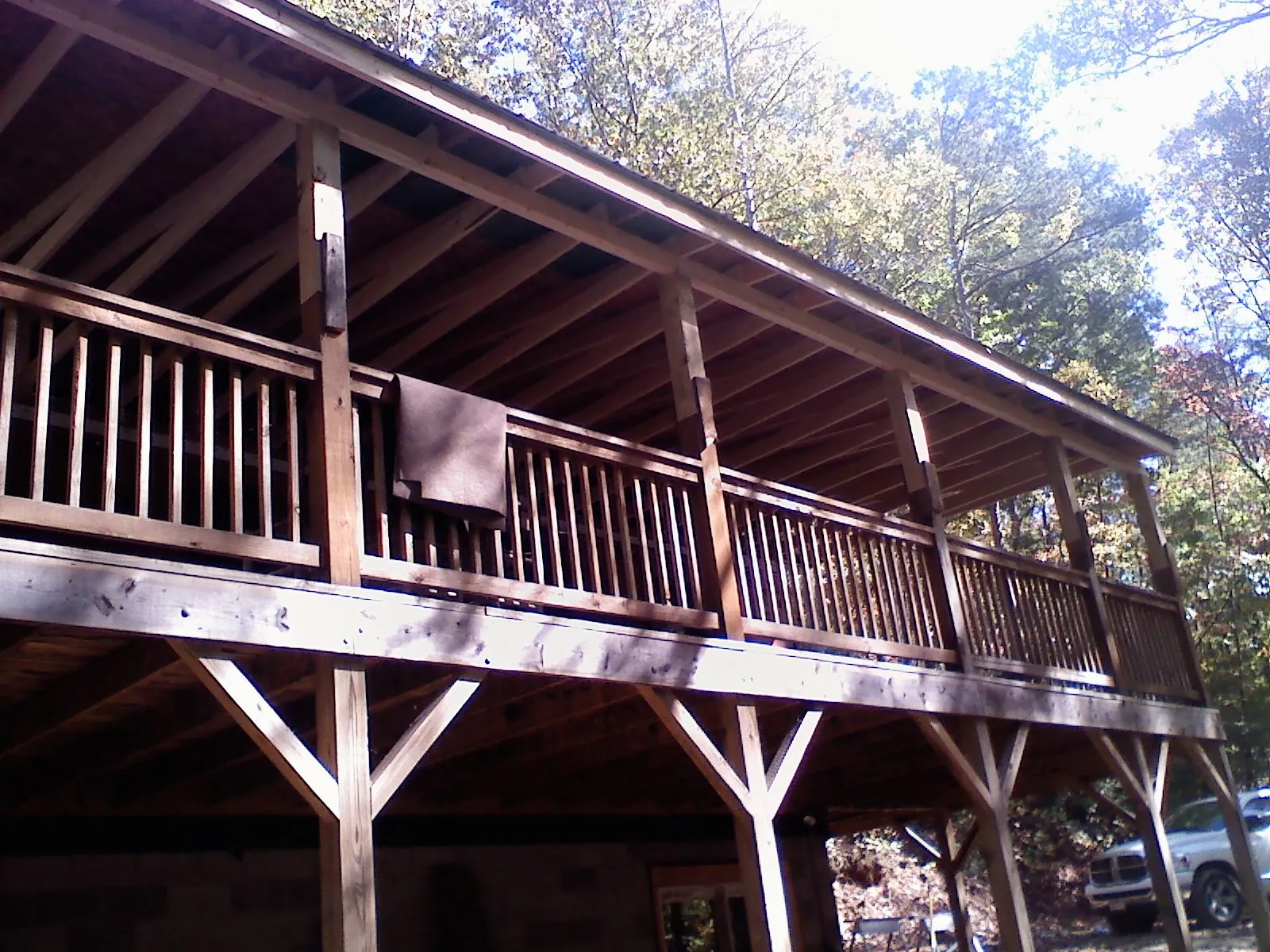 Timber framing under a new elevated porch and deck — Roof Leak Repair in Shaftsbury by Roofing Brothers